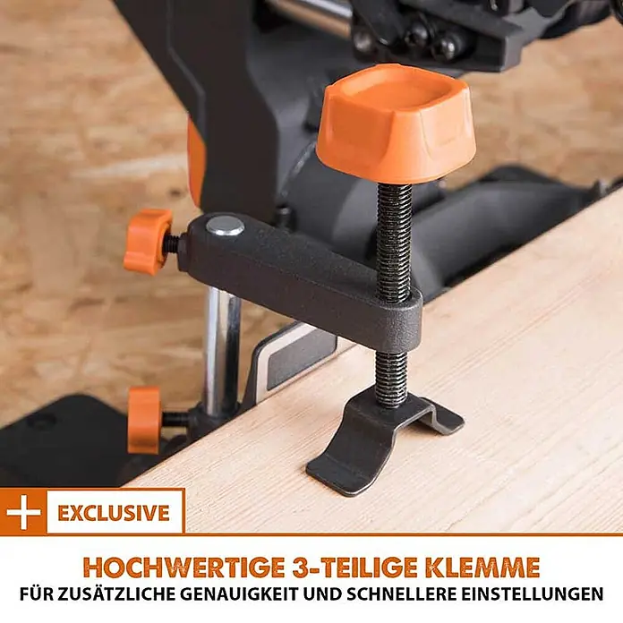 Evolution R185SMS+ Zug-Kapp- und Gehrungssäge 185 mm, TCT-Blatt -  - Eine schwarze und orange dreiteilige Klemme sichert ein Holzwerkstück für Präzision und schnelle Einstellungen.