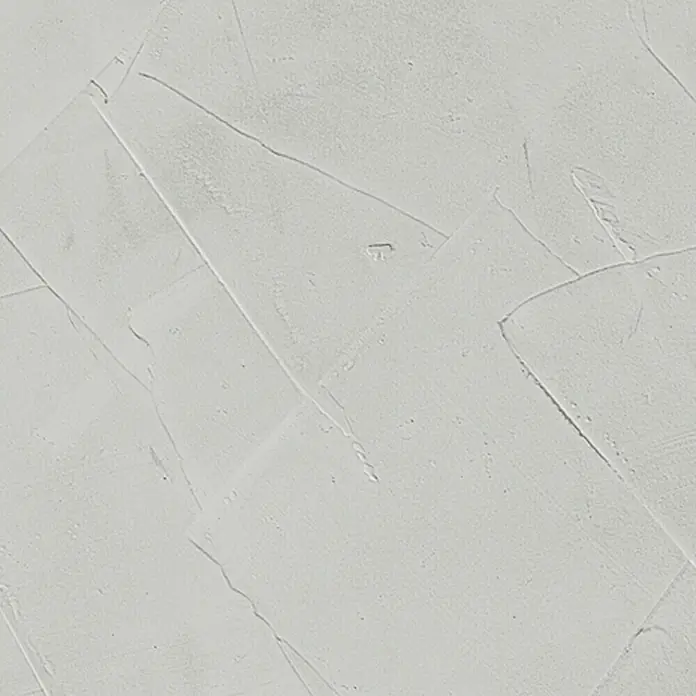 SCHÖNER WOHNEN-Farbe Trendstruktur Grundspachtel Beton-Optik - Grau, 5 kg, Matt - Nahaufnahme einer Wand mit grober, weißer Putzstruktur, die ein rustikales und strukturiertes Erscheinungsbild bietet.