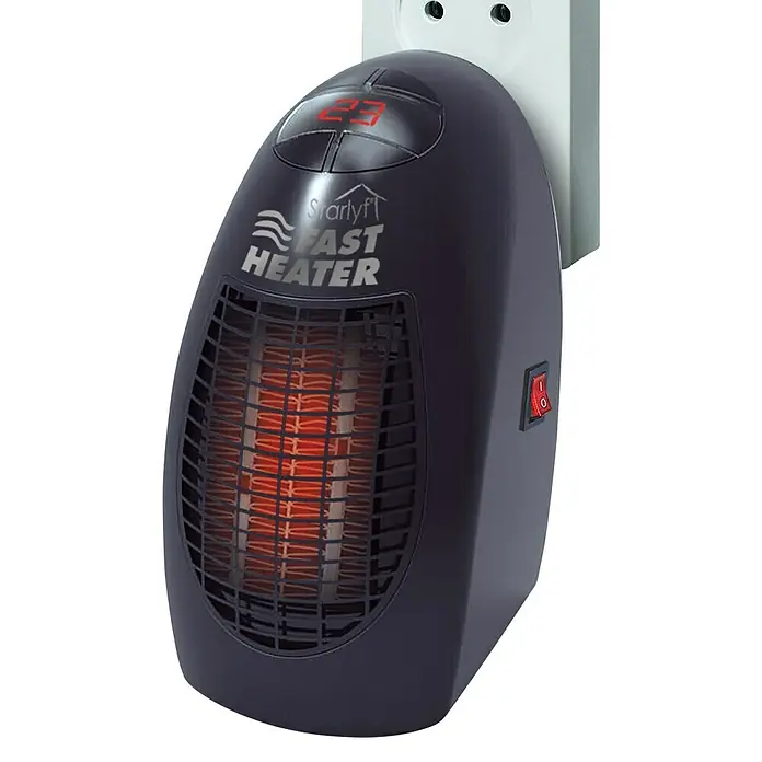 Heizlüfter Starlyf Fast Heater - 400 W, Schwarz - Nahaufnahme einer tragbaren, an die Wand angeschlossenen Mini-Heizung mit digitaler Anzeige.