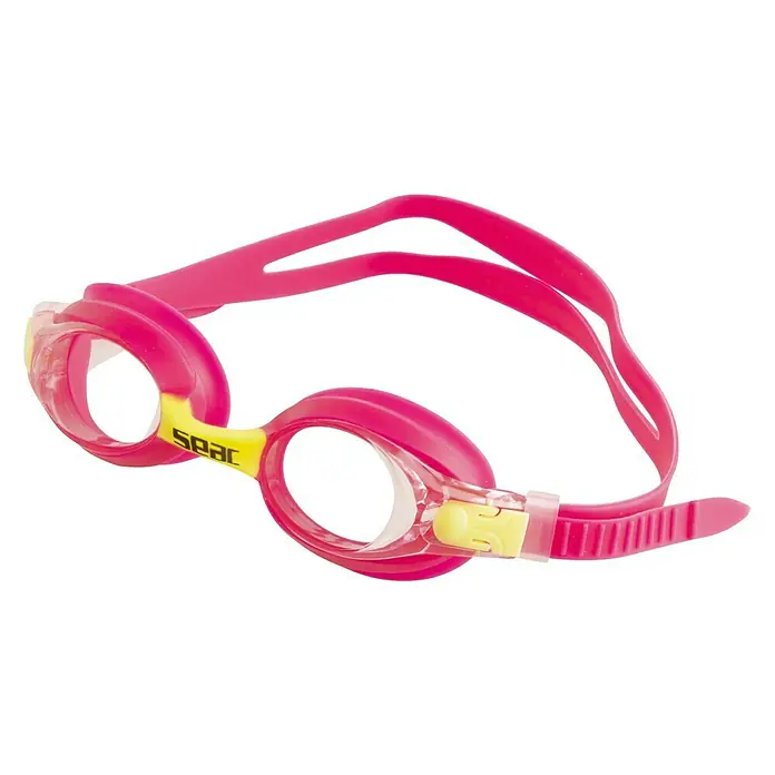 Seac Sub Gafas de natación Bubbles Junior - Rosa, Apto para: Niños - Primer plano de unas gafas de natación rosas con detalles amarillos y correa ajustable. Ideales para nadadores que valoran el estilo y la comodidad.