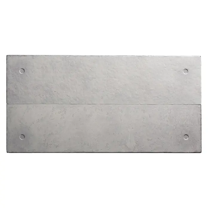 Panel de pared Concrete - 120 x 30 cm - Un bloque rectangular gris de hormigón con cuatro agujeros en las esquinas, perfecto como elemento de diseño elegante y robusto.