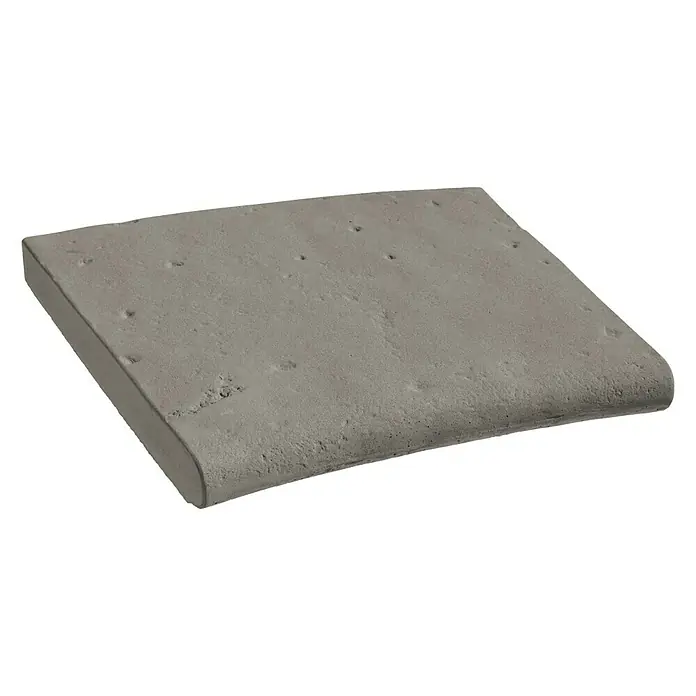 Pavimento remate curvo Opus Roca - 60 x 50 cm, Gris - Losa de hormigón gris con borde redondeado, ideal para uso exterior o como detalle arquitectónico.