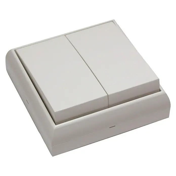 Fontini BF-25 Interruptor/Conmutador doble Monoblock - Blanco, Montaje en superficie - Primer plano de un interruptor de luz doble color crema, que muestra un diseño moderno y funcionalidad para el control de la iluminación.
