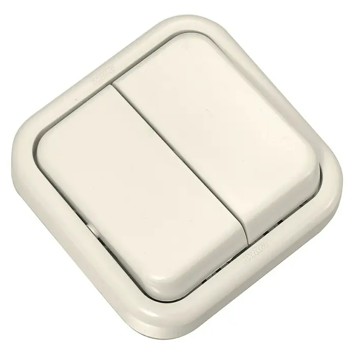 Fontini Kristal Conmutador doble - Marfil, Montaje en superficie - Primer plano de un interruptor de luz doble blanco, montado en una pared, utilizado para controlar la iluminación de una habitación.