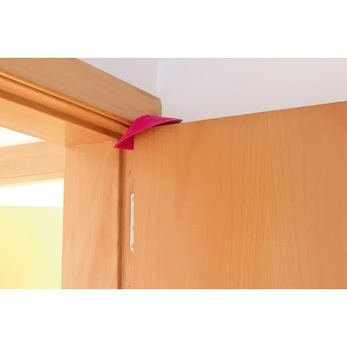 Tope de puerta y ventana Ovni Blockystar - Plástico, Ø x Al: 12 x 3 cm, Rosa - Un tope de puerta rosa mantiene una puerta de madera abierta al encajarse entre la puerta y el marco. Accesorio práctico para el hogar.