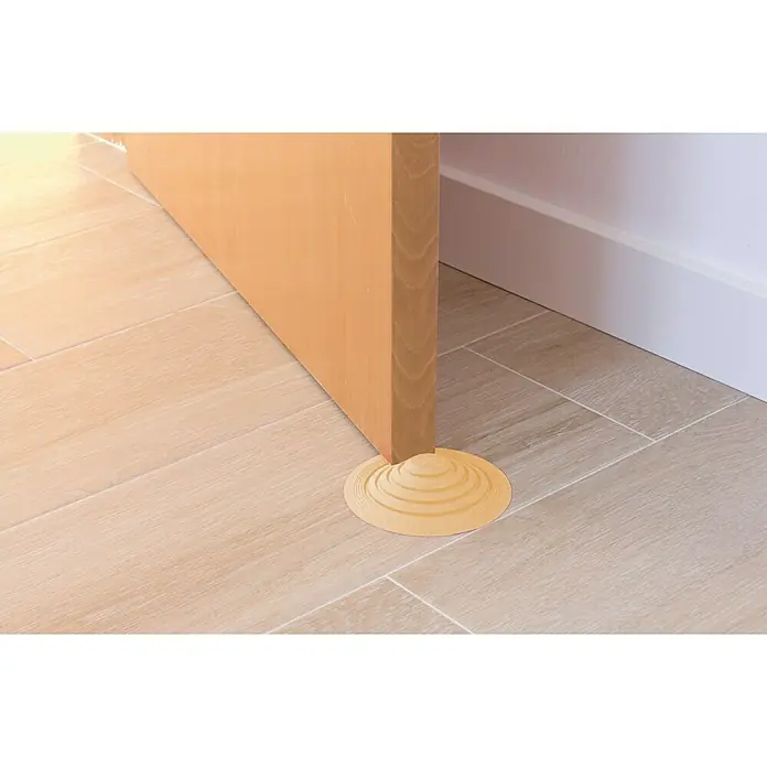 Tope de puerta y ventana Ovni Blockystar - Plástico, Ø x Al: 12 x 3 cm, Beige - El tope de puerta en espiral mantiene la puerta abierta de forma segura mientras protege el suelo de daños.