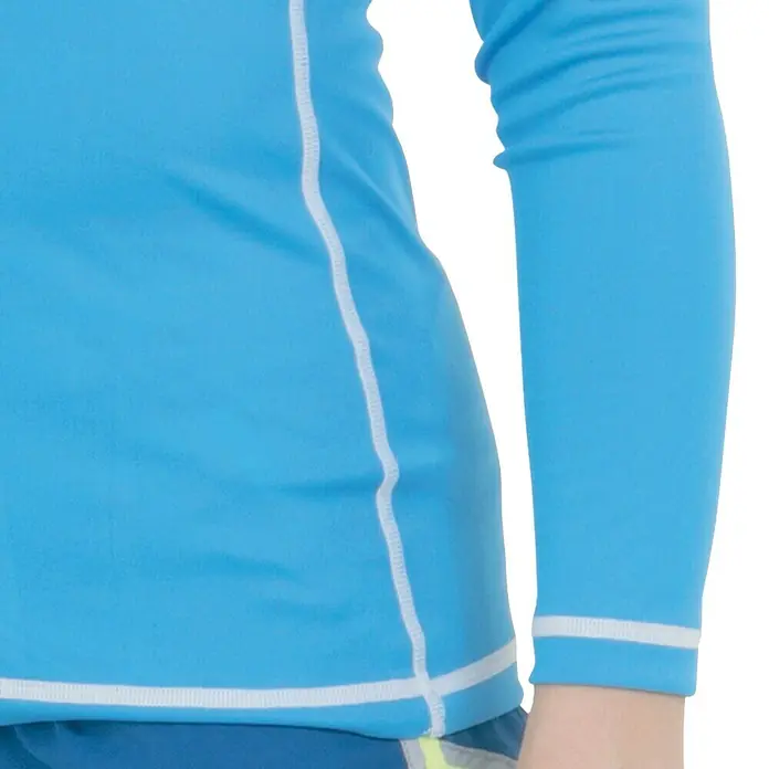 Seac Sub Camiseta térmica T-Sun Long - Apto para: Niños, 7 años, Azul - Primer plano de un rash guard de manga larga azul claro con detalles blancos. Ideal para protección solar durante la natación.