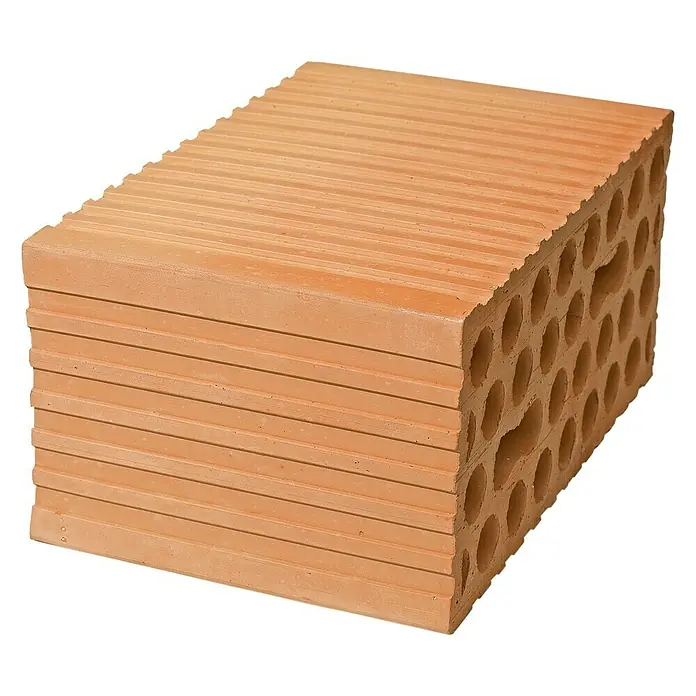 BHS Mallorca Ladrillo panal - 14 x 29 cm, Rojo - Primer plano de un ladrillo rojo con ranuras horizontales y agujeros.