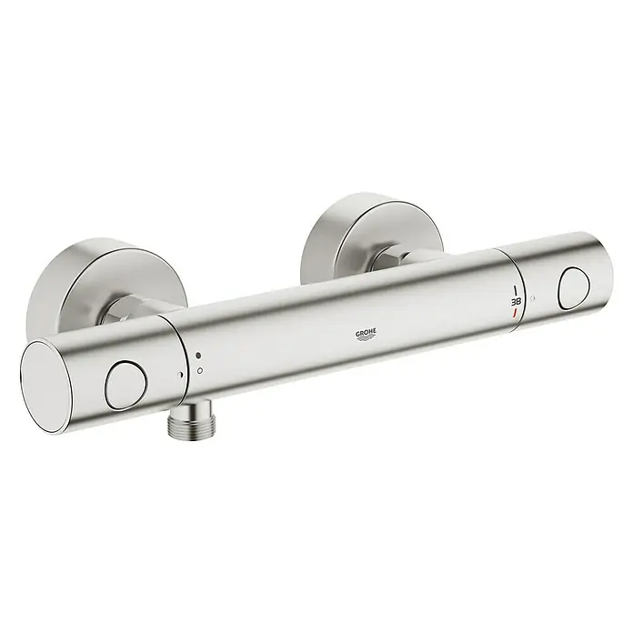 Grohe Grohtherm 1000 Cosmopolitan Thermostatarmatur - Supersteel, Matt - Nahaufnahme einer Grohe-Thermostatarmatur in gebürstetem Nickel. Das Produkt verfügt über eine 38°C-Sicherheitssperre.