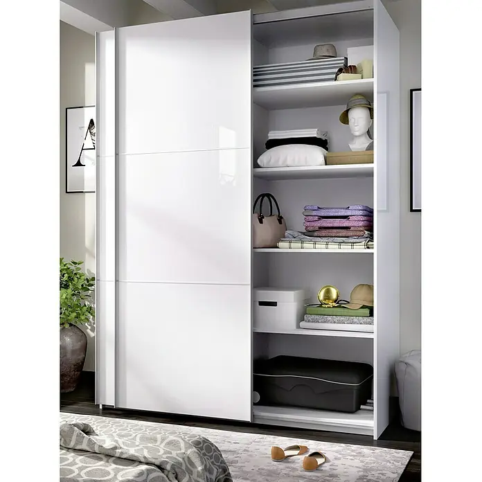 Dekit Set de estanterías - L x An x Al: 180 x 87 x 1,6 cm, Blanco - Un armario blanco moderno con puertas correderas, parcialmente abierto, que revela un interior bien organizado con estantes y accesorios.