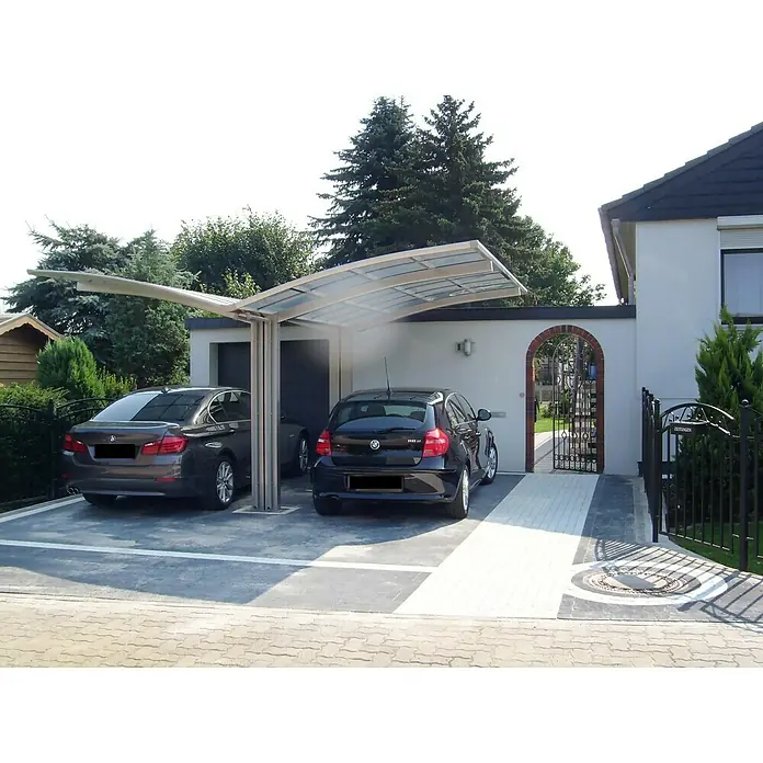 Ximax Carport Portoforte Y 60 - Außenmaß inkl. Dachüberstand (B x T): 5,43 x 4,95 m, Doppelcarport, Edelstahloptik, Schneelast: 75 kg/m² - Ansicht eines modernen Carports mit zwei geparkten Autos. Der Carport bietet Schutz und fügt sich nahtlos in die Hausarchitektur ein.