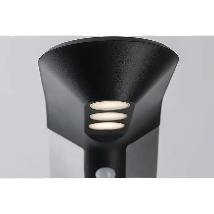 Paulmann Soley Baliza exterior LED - Blanco cálido, IP44, Antracita - Primer plano de una lámpara de exterior negra moderna con tres LED brillantes y un sensor de movimiento, ideal para la iluminación del jardín.