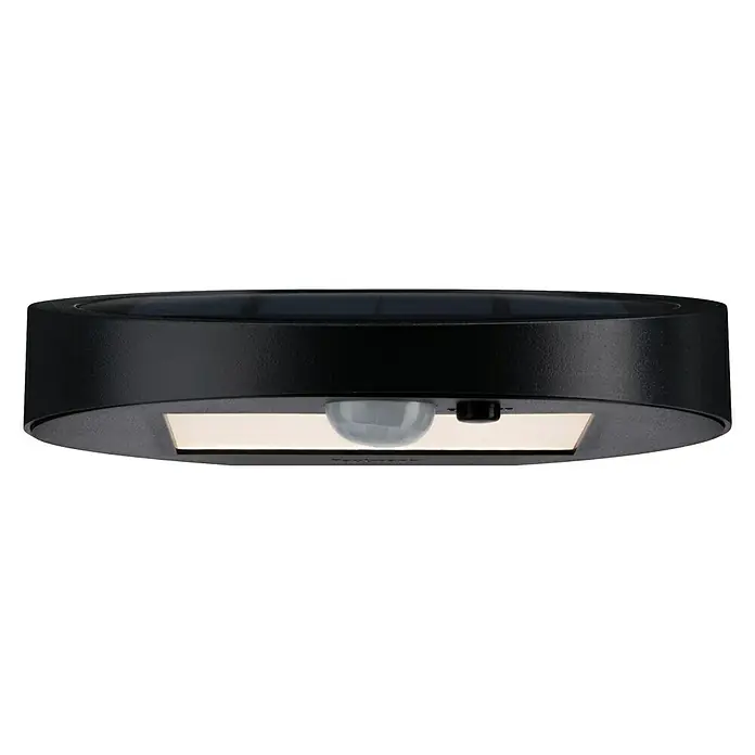 Paulmann Ryse Solar-Außenwandleuchte - 1,2 W, L x B x H: 14,7 x 15,4 x 4,1 cm, Anthrazit, IP44 - Nahaufnahme einer schwarzen Steinel-Außenleuchte mit Solarpanel, Bewegungssensor und integrierter Beleuchtung.