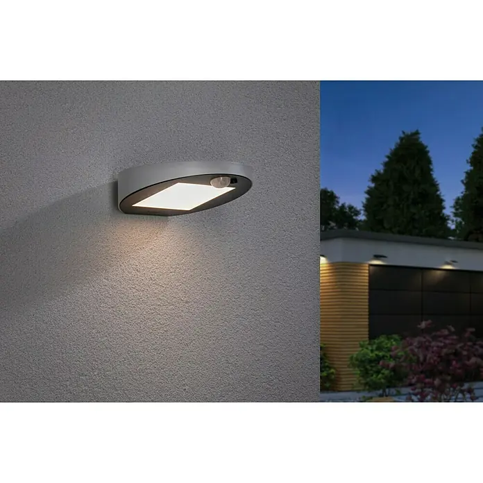 Paulmann Ryse LED-Solar-AußenwandleuchteBewegungsmelder, 1,2 W, Material: Kunststoff, Warmweiß, Weiß - Moderne graue Wandleuchte mit Bewegungsmelder, die ein helles, einladendes Licht an der Hauswand spendet.