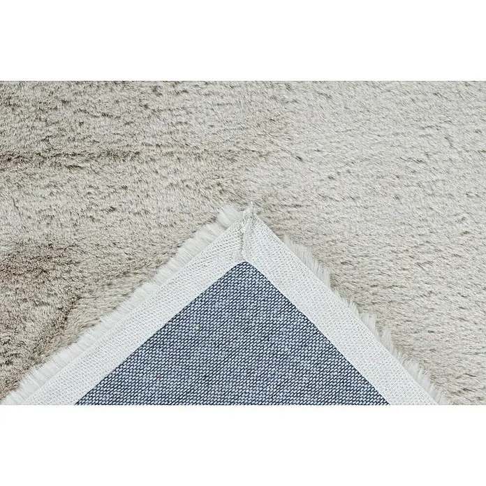 Fellteppich Happy - Beige, 230 x 160 cm, 100 % Polyester (Flor) - Detailansicht eines grauen Shaggy-Teppichs mit hochflorigem Flor und gewebter Rückseite. Ideal für Wohnzimmer und Schlafzimmer.