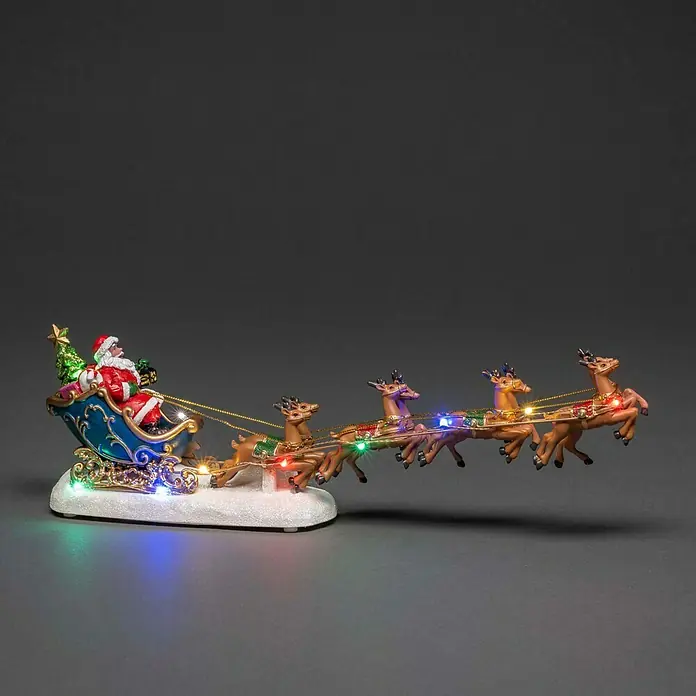 Konstsmide LED-Szenerie Weihnachtsmann/Rentiere - L x B x H: 35,5 x 6,5 x 14 cm, Bunt, Batteriebetrieben, LED - Weihnachtliche Dekoration mit Santa im Schlitten, gezogen von Rentieren mit Lichtern, für festliche Stimmung.