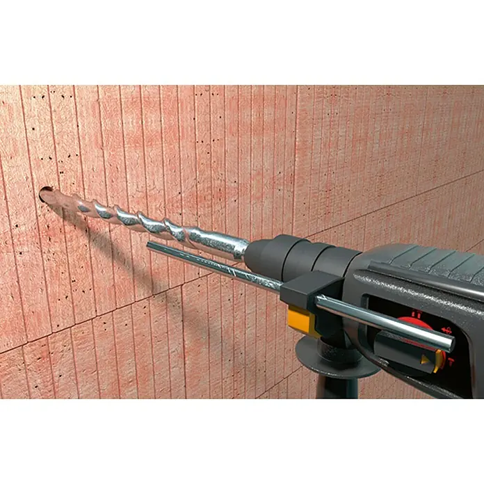 Fischer Broca universal Pointer - 1 ud., Diámetro de la broca: 6 mm - Una broca perfora una pared de ladrillos. La herramienta está bien definida, con énfasis en su función.