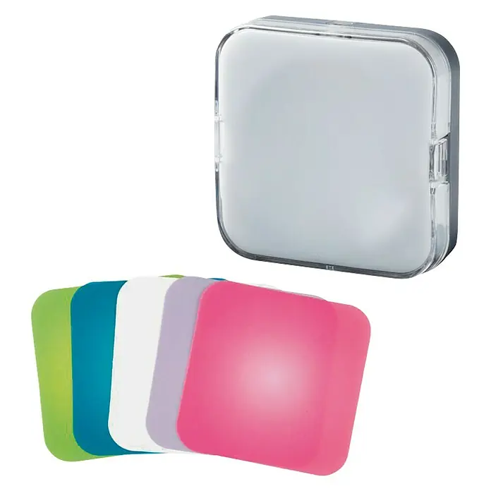 Legrand Luz de noche LED con sensor crepuscular - 0,4 W, Blanco, L x An x Al: 8,5 x 8,5 x 4,5 cm - La imagen muestra una caja cuadrada y transparente con estantes de colores. La caja está vacía y los estantes son de varios colores.
