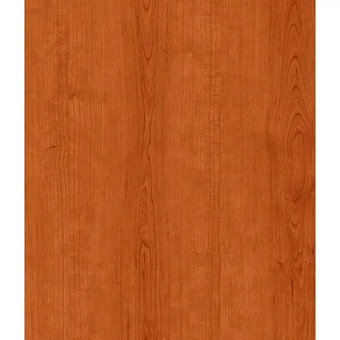 Maderas Daganzo Canto de PVC Berlín 0,4 mm - 200 m x 22 mm x 4 mm, Cerezo - Detalle de una superficie de madera en tonos marrones cálidos, destacando la veta y la textura natural de la madera.