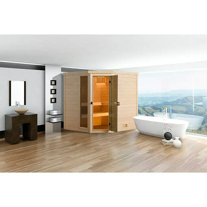 Finnwood Massivholzsauna Bjoern Trend 2 - Bioofen, Steuerung Ofen: Extern, L x B x H: 178 x 195 x 203 cm - Helle Holzsauna mit Glasfront in einem Badezimmer mit Badewanne und Waschtisch. Die Sauna bietet Platz zum Entspannen.