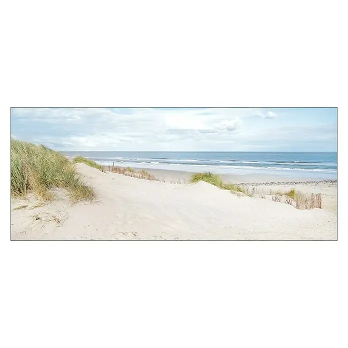 Glasbild - Seeblick IV, B x H: 125 x 50 cm - Dünenlandschaft mit Sand, Gras und Meer unter bewölktem Himmel, ruhige und friedliche Strandszene.