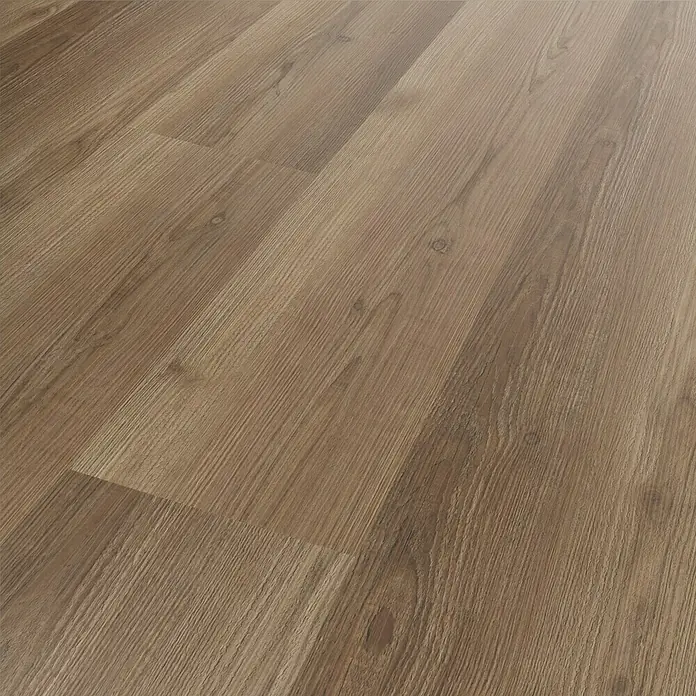 Vinylbodenmuster Strong SPC Hainich - 280 x 160 x 3,8 mm, Landhausdiele - Detailaufnahme eines Laminatbodens in Holzoptik, der eine warme und natürliche Atmosphäre vermittelt. Die Maserung ist deutlich sichtbar.