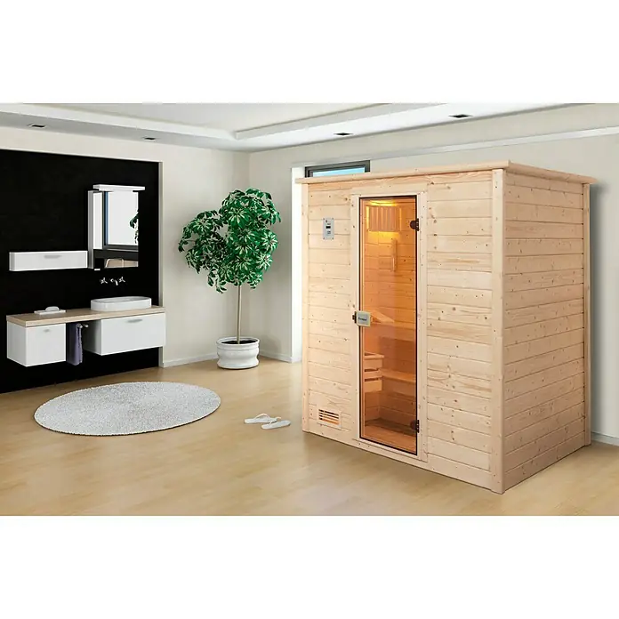 Finnwood Massivholzsauna Bjoern 1 - Bioofen, Steuerung Ofen: Extern, L x B x H: 148 x 198 x 203 cm - Eine moderne Holzsauna mit Glastür in einem stilvollen Badezimmer. Das natürliche Design fügt sich perfekt in die Umgebung ein.