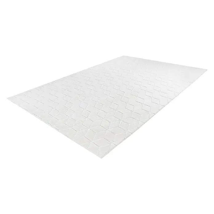 Kayoom Hochflorteppich Vivica 125 - Weiß, 160 x 120 cm - Nahaufnahme einer Matratze mit einem feinen, geprägten Muster. Sie bietet Komfort und Unterstützung für einen erholsamen Schlaf.