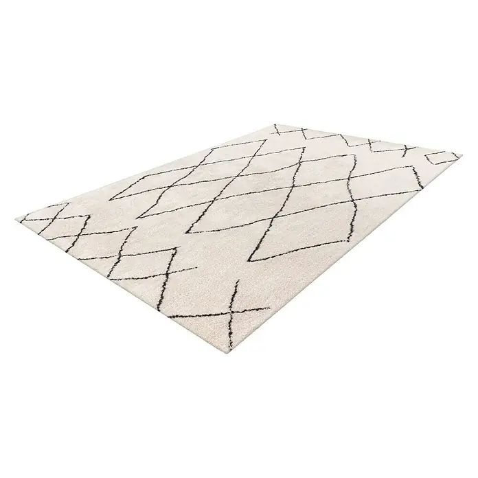 Kayoom Hochflorteppich Orlando 425 - Elfenbein, 150 x 80 cm - Dieser Teppich besticht durch sein schlichtes, geometrisches Rautenmuster in Schwarz auf einem cremefarbenen Hintergrund. Er ist ein eleganter Blickfang.