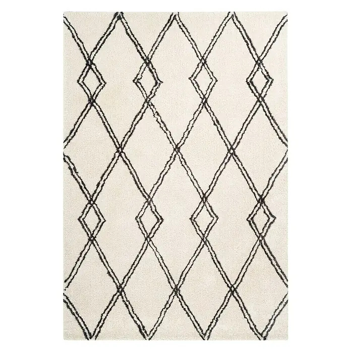 Kayoom Hochflorteppich Orlando 125 - Elfenbein, 150 x 80 cm - Ein cremefarbener Teppich mit einem markanten, sich wiederholenden schwarzen Rautenmuster, das dem Teppich eine moderne Note verleiht.