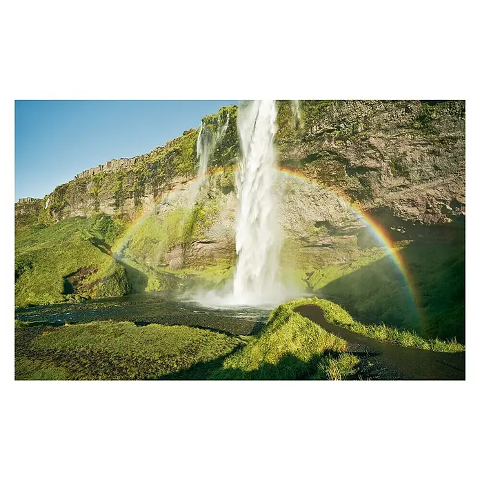 Komar Stefan Hefele Edition 2 Fototapete Power of Iceland - 9 -tlg., B x H: 450 x 280 cm, Vlies - Seljalandsfoss Wasserfall mit Regenbogen. Beeindruckendes Naturschauspiel mit Wasserfall und strahlendem Regenbogen.