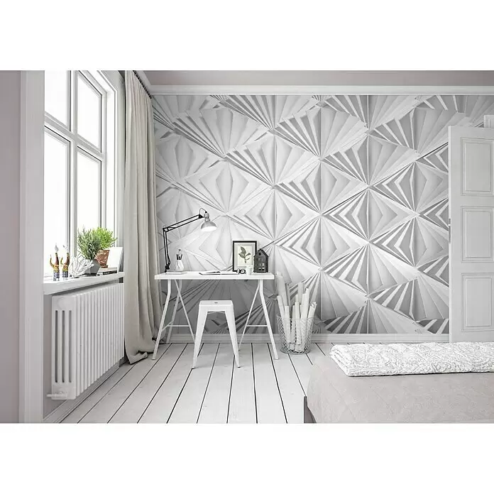 Komar Imagine Edition 3 - Stories Fototapete Delta - 8 -tlg., B x H: 368 x 254 cm, Papier - Weiße 3D-Wandpaneele mit geometrischem Fächerdesign als moderne Akzentwand in einem Schlafzimmer-Arbeitsbereich.