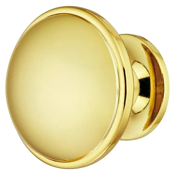Häfele Pomo para muebles - Tipo de tirador del mueble: Botón, Ø x Al: 36 x 28 mm - Primer plano de un pomo de puerta dorado brillante con forma redonda y diseño clásico sobre un fondo negro.