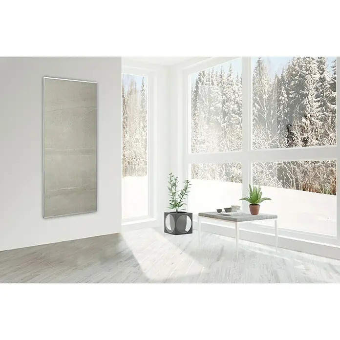 Jollytherm Infrarot-Keramikheizkörper - B x H: 600 x 1.200 mm, 1.100 W, Grau - Das Bild zeigt einen eleganten Infrarot-Wandheizkörper mit einem schlanken Rahmen in einem hellen, modernen Raum mit Winterlandschaft.