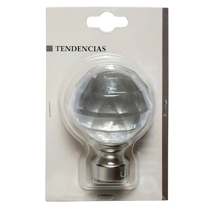 Tapa final Diamante Tendencias - Plata, 1 ud. - Primer plano de un extremo de barra de cortina con bola de cristal en un embalaje transparente, combinando elegancia y funcionalidad.