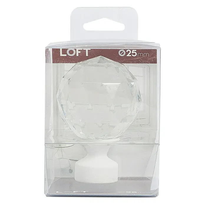 Tapa final Diamante - Blanco, 1 ud. - Primer plano de un pomo de mueble LOFT en su embalaje, con un pomo de cristal transparente de 25 mm de diámetro, perfecto para adornos de muebles elegantes.
