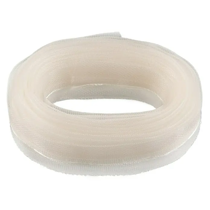 Cinta fruncidora - L x An: 5 m x 25 mm, Semi-transparente - Un rollo de cinta de tul blanca y flexible. Ideal para decorar ropa, accesorios y artículos de decoración para el hogar.