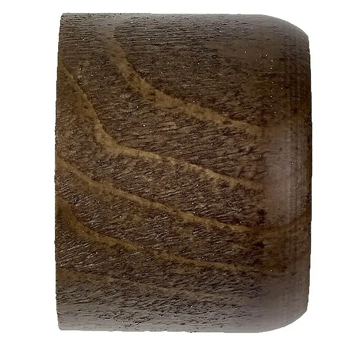 Tapones terminales Ideas Wood - Nogal, 2 ud. - Primer plano de una tapa de madera oscura redondeada con una veta prominente, que destaca la textura natural de la madera.