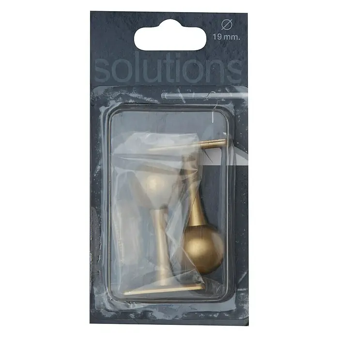 Tapones terminales Soporte - Bronce, 2 ud., Específico para: Para barras con un diámetro de 19 mm - Primer plano de un juego de topes de puerta empaquetado con un acabado dorado. El producto está firmemente incrustado en un recipiente de plástico transparente.