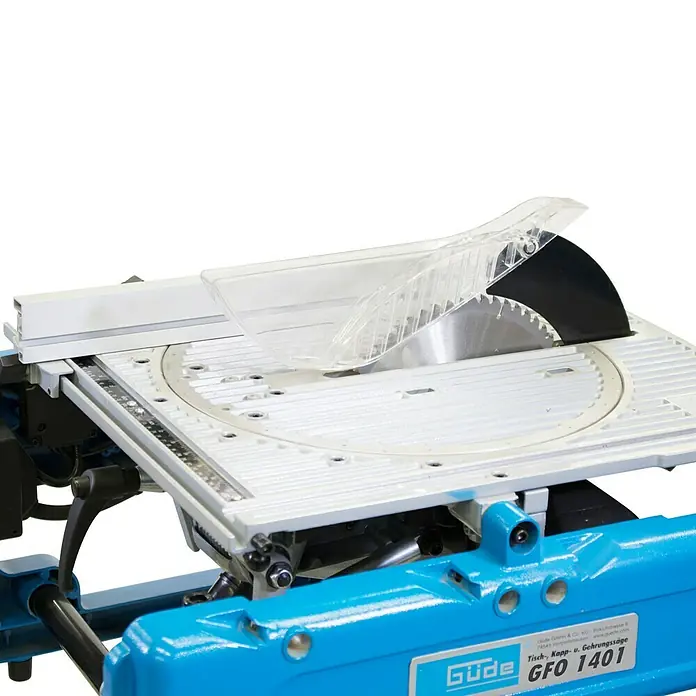 Güde Kapp- & Gehrungssäge GFO 1401 - 1.400 W, Durchmesser Sägeblatt: 216 mm, 5.000 U/min - Nahaufnahme einer Güde GFO 1401 Tisch-, Kapp- u. Gehrungssäge, ideal für präzise Holzschnitte in Werkstätten und Baustellen.