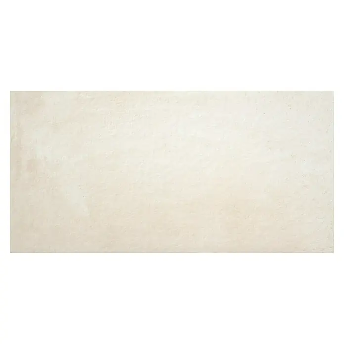 BHS Showroom Pavimento porcelánico Stoneage Soft - 120 x 60 cm, Arena, Resistencia a la abrasión - PEI: 4 - Tránsito intenso, Rectificado - Patrón abstracto color crema en la superficie de una baldosa de cerámica, con una textura sutil.