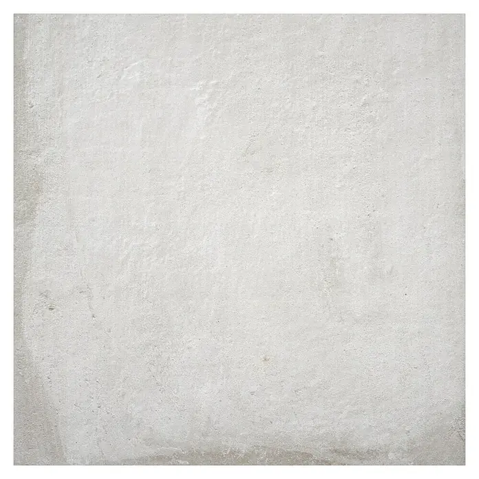 BHS Showroom Pavimento porcelánico Stoneage Soft - 60 x 60 cm, Concreto, Rectificado - Un primer plano revela la textura fina de una superficie gris claro y texturizada, que muestra una elegancia sutil.
