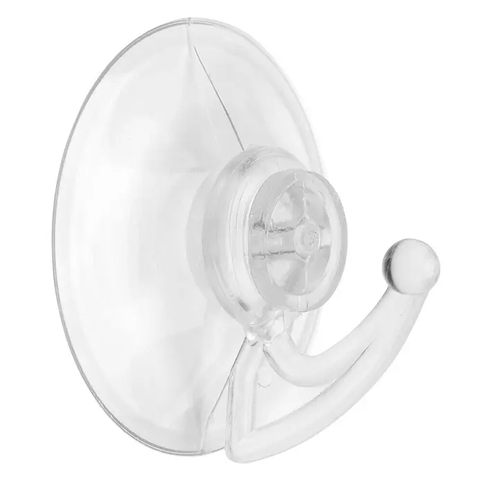 Inofix Gancho con ventosa 1207 - Plástico, Blanco - Primer plano de un gancho transparente con ventosa para adherir a superficies lisas, ideal para baño o cocina.
