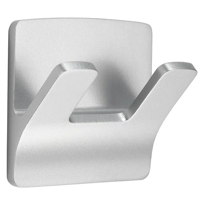 Inofix Colgador adhesivo 2192 - Cromo - Primer plano de un moderno gancho doble plateado para montaje en pared, ideal para baños o pasillos. Ofrece soluciones de almacenamiento.
