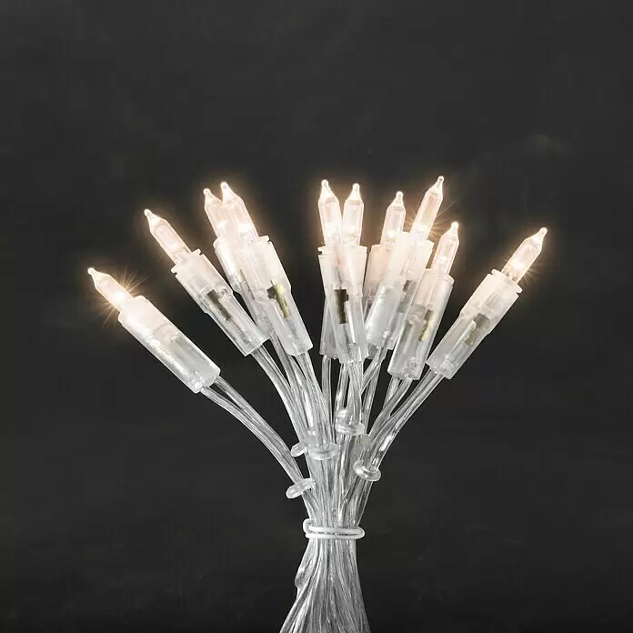 Konstsmide LED-Lichterkette - Innen, Lichtfarbe: Warmweiß, Anzahl Leuchtmittel: 10 Stk., Netzbetrieben - Ein Bündel leuchtender LED-Lichterketten mit klaren Kunststoffbirnen und Verkabelung, zusammengebunden.