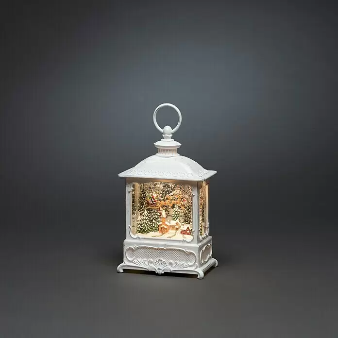 Konstsmide LED-Schneelaterne - Innen, Altweiß, 8,5 x 13,5 x 25 cm, Weihnachtsmann, Batteriebetrieben - Weiße Weihnachtslaterne mit beleuchteter Weihnachtsmann-, Rentier- und Schneelandschaft im Inneren.