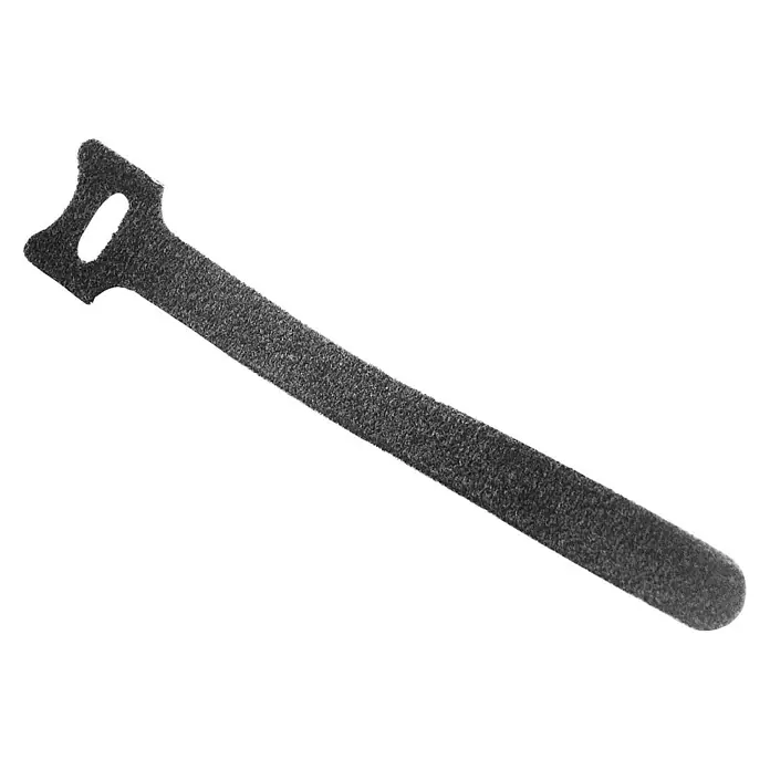 Voltomat Klett-Kabelbinder - Schwarz, 22 x 1,2 x 135 mm, 6 Stk. - Ein einzelner grauer Kabelbinder vor schwarzem Hintergrund, der eine einfache und effiziente Lösung zur Kabelführung darstellt.