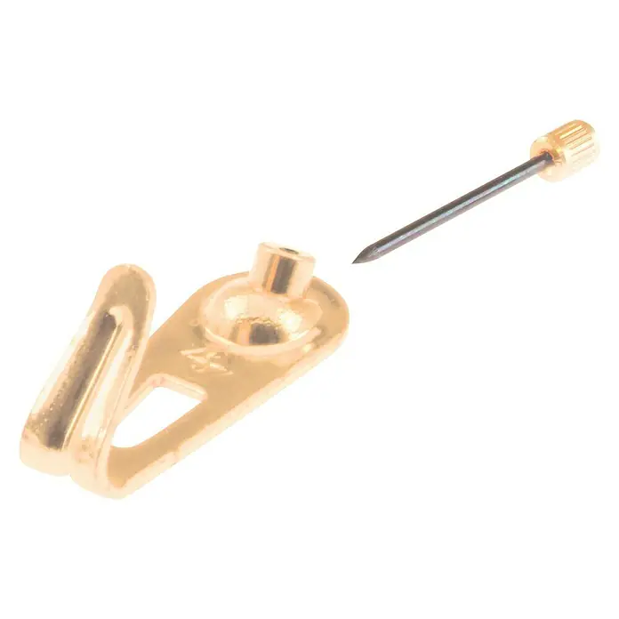 Stabilit BilderhakenL x B: 28 x 11 mm, 7 Stk. - Nahaufnahme eines goldenen Bilderhakens mit Nagel, ideal zum Aufhängen von Bildern und Wanddekorationen.