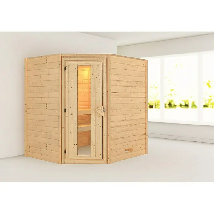 Karibu Massivholzsauna Mia - L x B x H: 170 x 196 x 198 cm, Materialspezifizierung Tür: Massivholz, Inklusive Ofenschutzgitter, Ohne Dachkranz - Freistehende Holzsauna mit Glastür in einem hellen Raum. Ideal für Entspannung und Wellness zu Hause, bietet Wärme und Komfort.