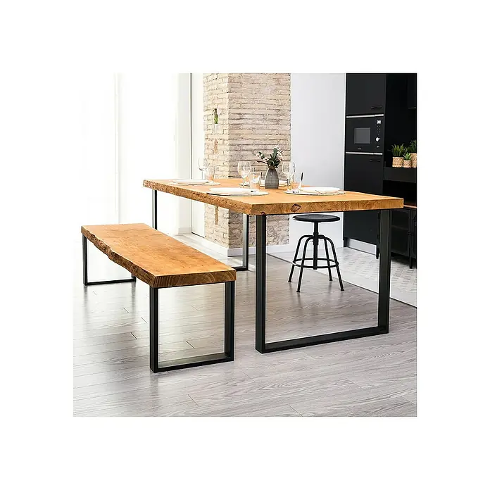 Rei Pata para muebles 913 - L x An x Al: 8 x 58 x 71,2 cm, Capacidad de carga: 250 kg, Acero - Una mesa de comedor con tablero de madera rústica y estructura de metal negro, junto con un banco de madera a juego.